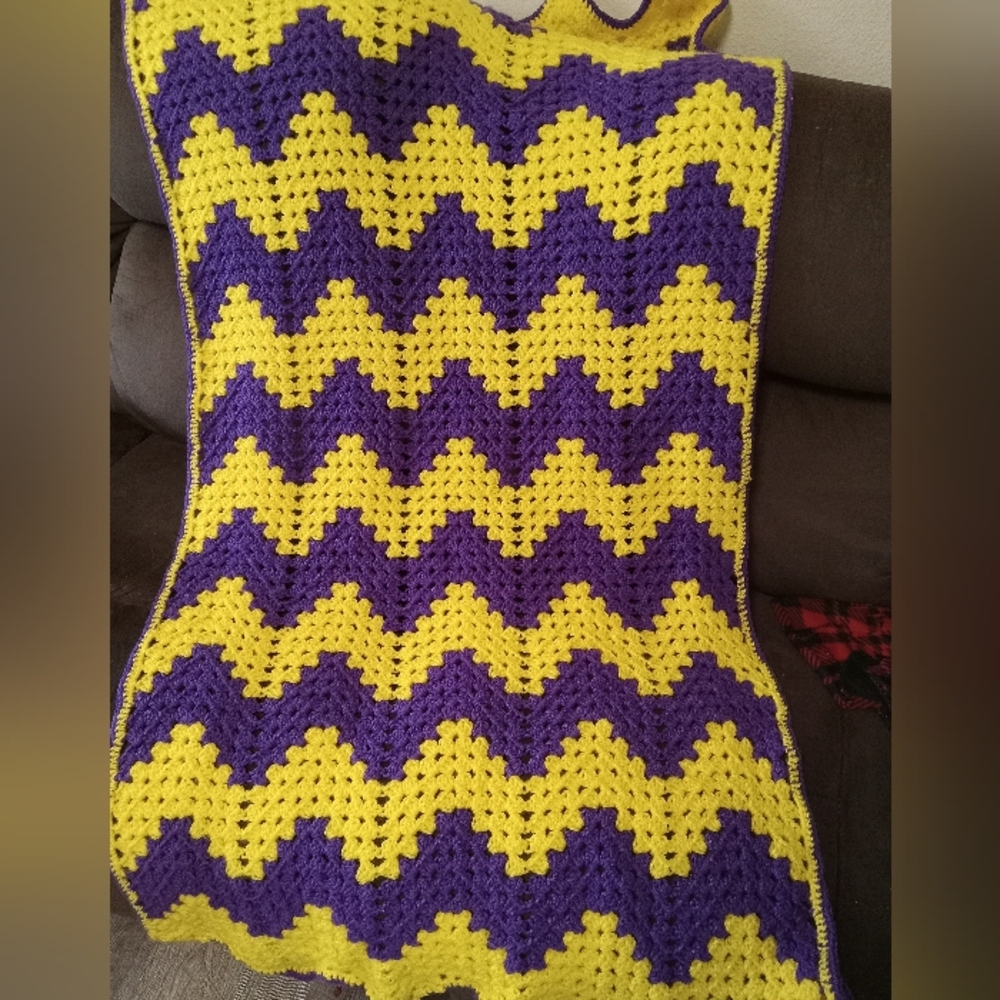 Handcrafted crochet purple and yellow ripple blanket